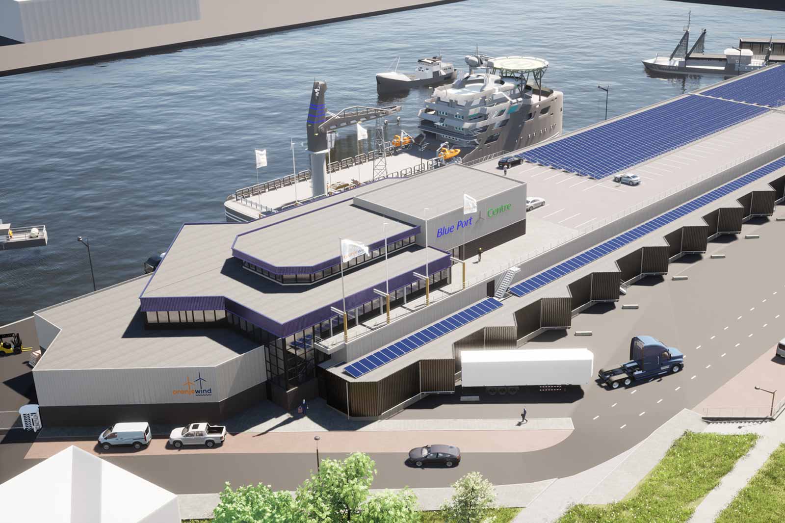Luchtfoto van het Blue Part Centre met zonnepanelen, voertuigen en een groot schip dat aan de kade ligt.